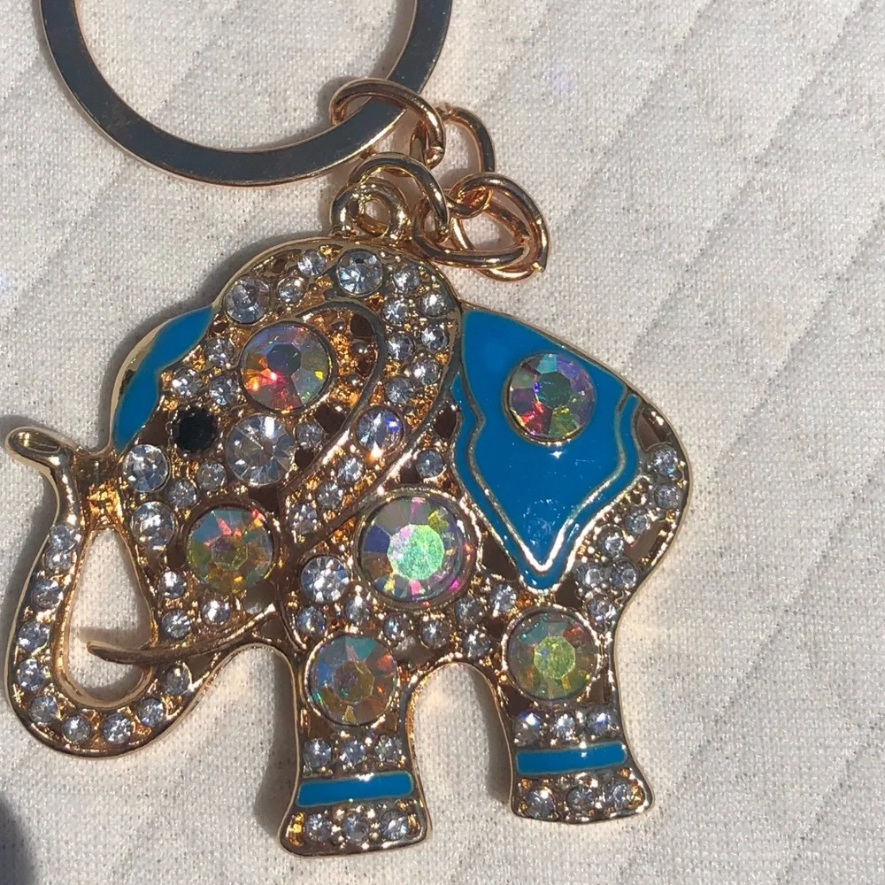 Beautiful lightweight sparkly elephant keychain 💙🐘🤍 - Picture 6 of 7